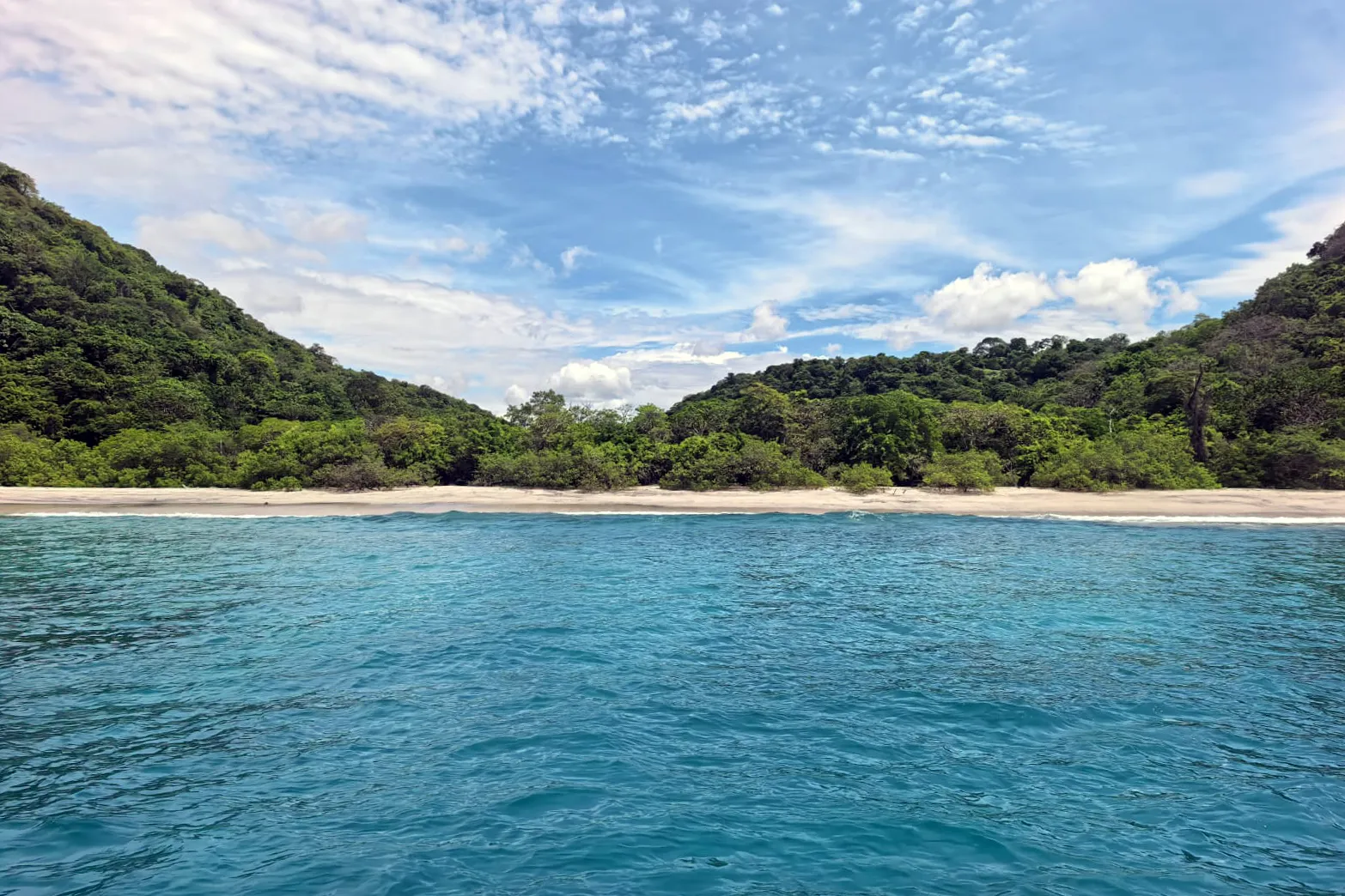 Sandy beach and green coastline in the Gulf of Papagayo on October 20, 2026