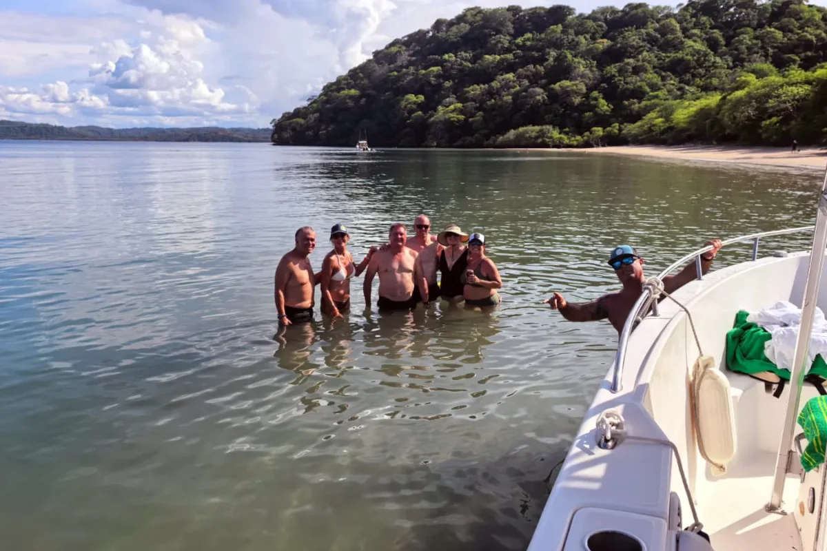 Guests enjoying the water beside a MarSea Tours boat in the Gulf of Papagayo